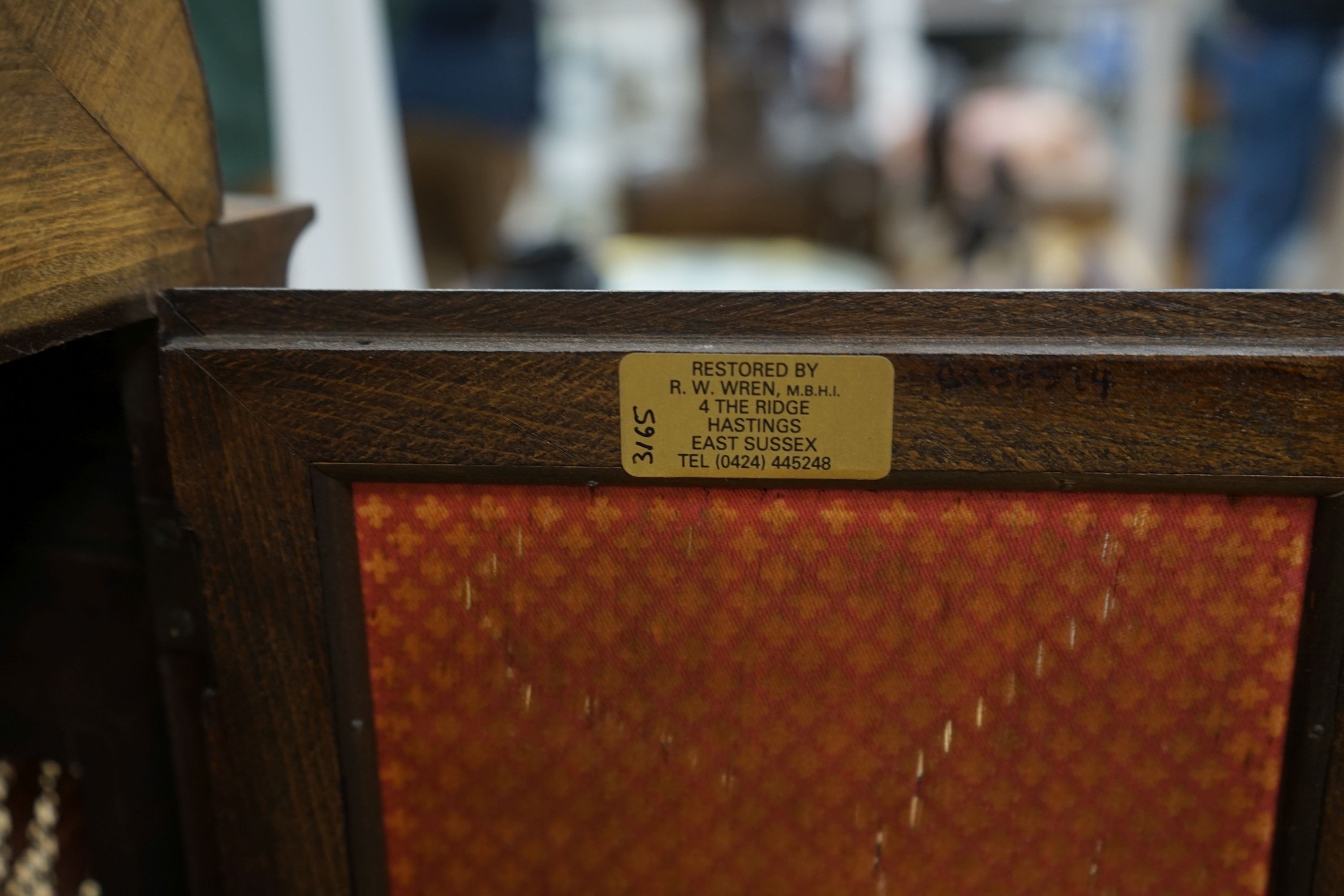 A German rosewood and marquetry chiming mantel clock, early 20th century, 45cm